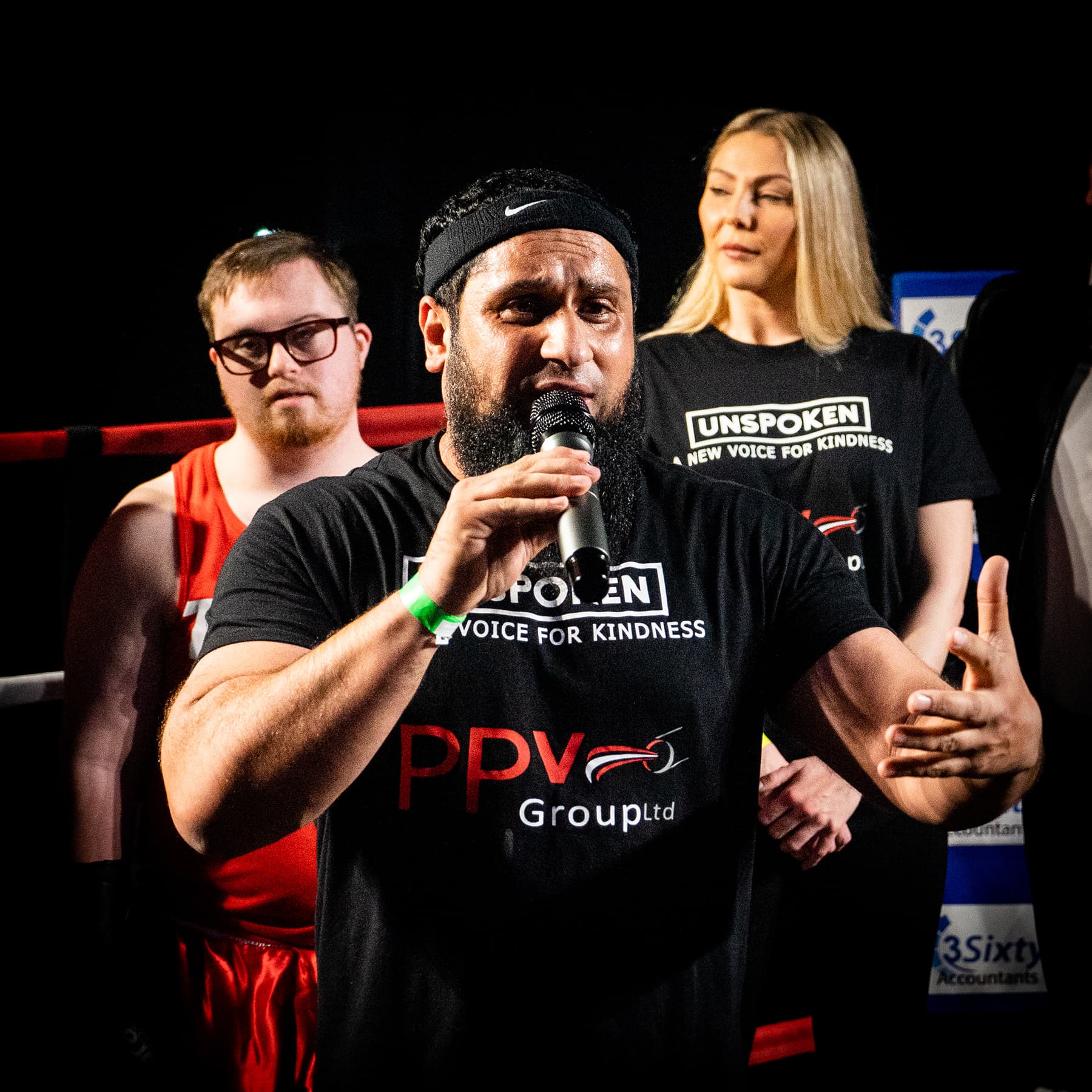 Atiq speaking at the charity boxing event